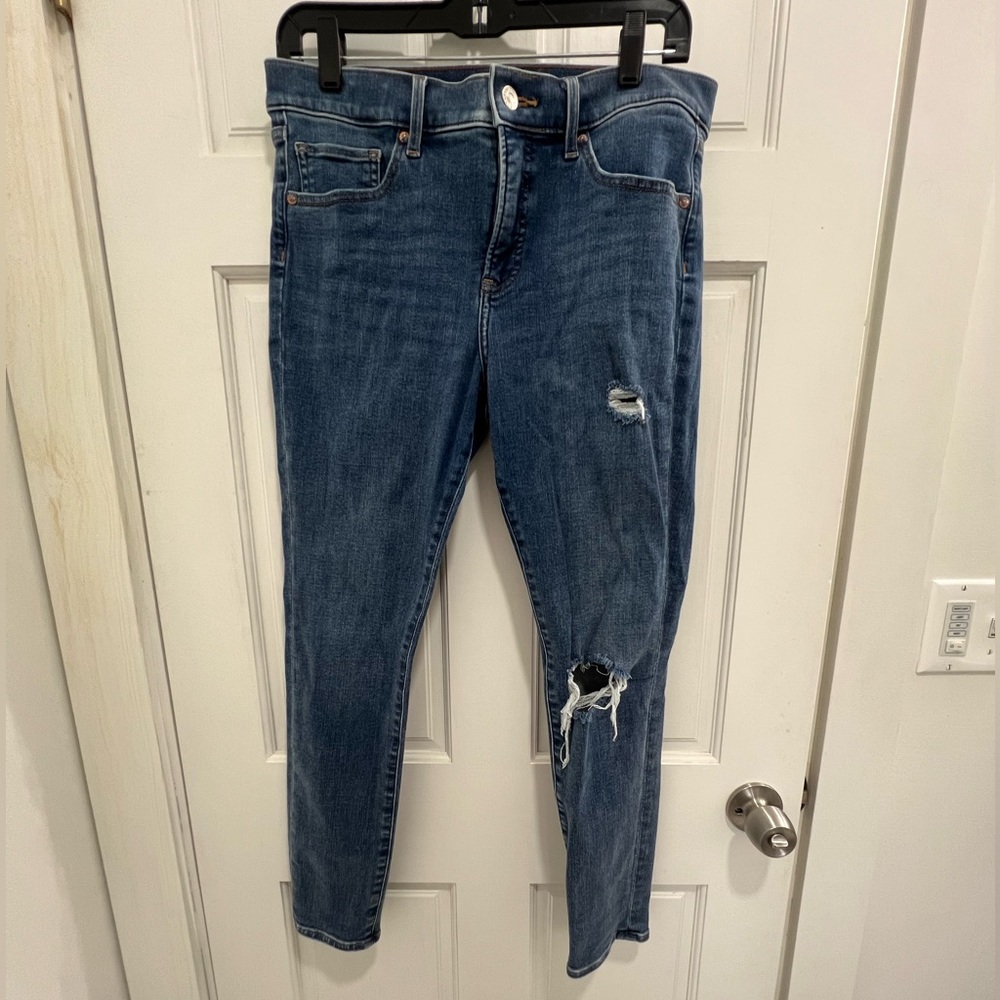 Express Skinny Mid Rise 4-way hyper stretch Jeans distressed